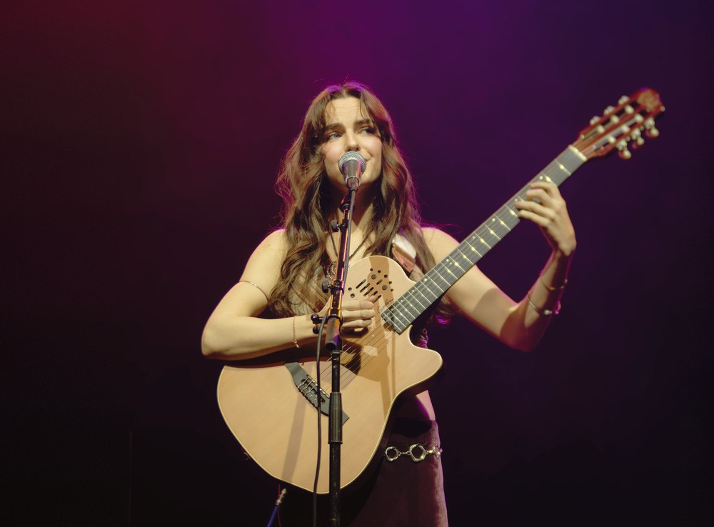 Chloe performing on stage