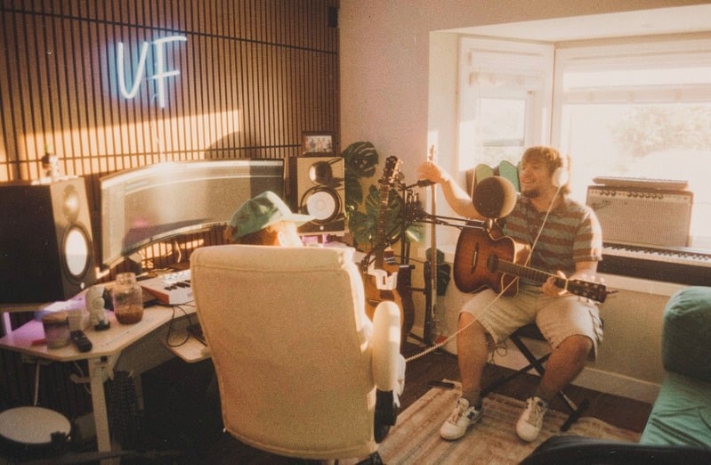 An acoustic guitar take in the Spaceship