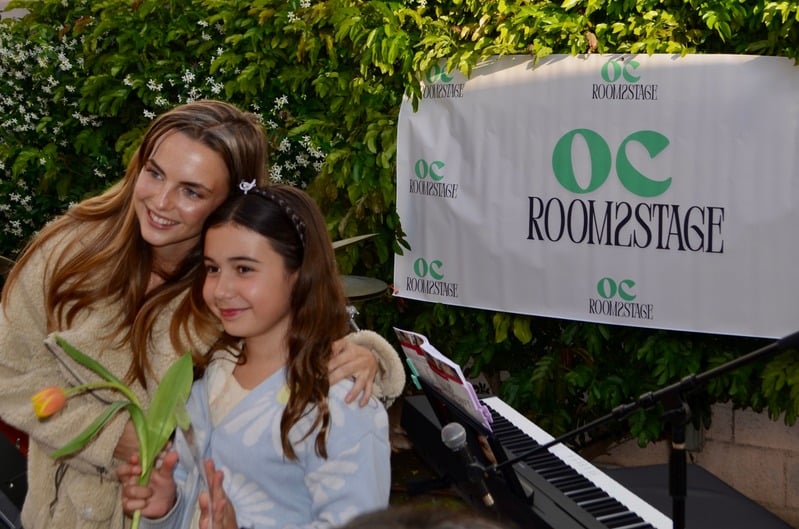 A young student at an OC Room2Stage showcase